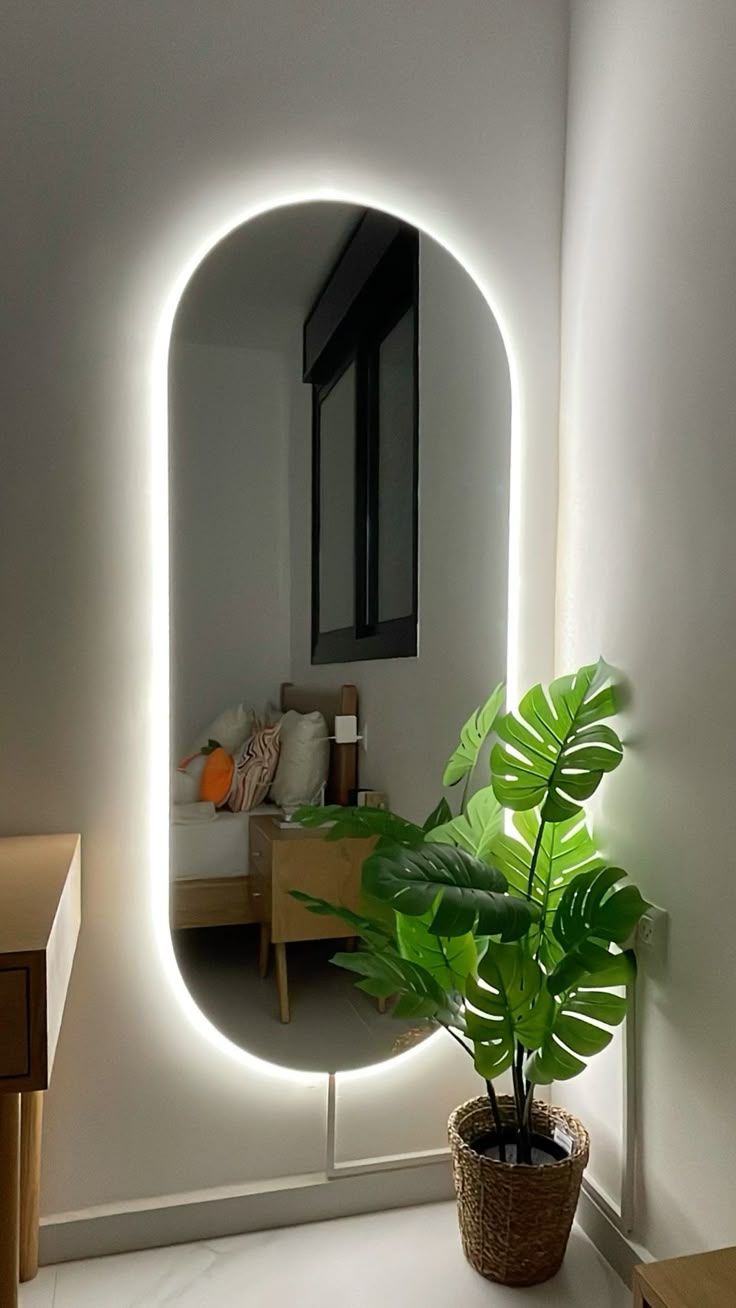 Sleek Oval LED Wall Mirror