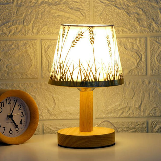 Wooden table lamp with decorative shade